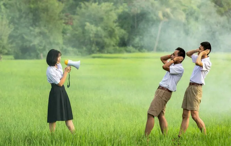 person talking into a megaphone