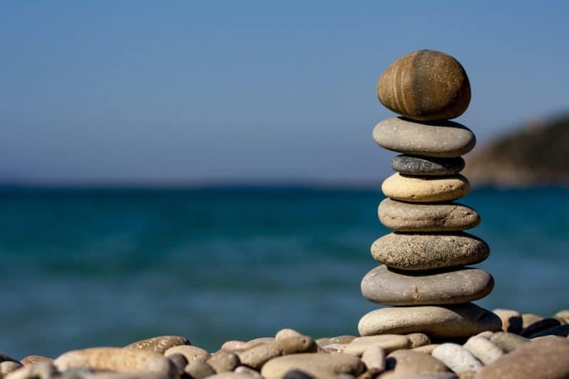 stacked rocks symbolizing mix balance