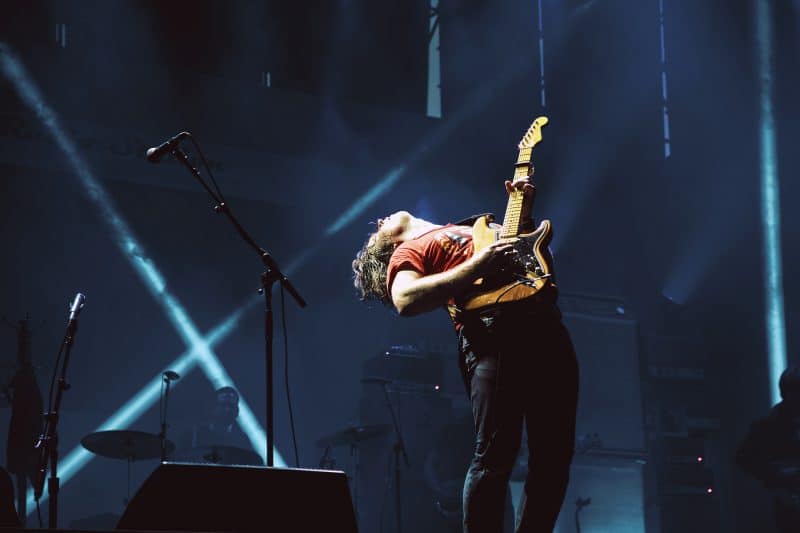 guitarist performing on stage