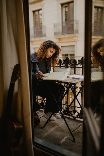 person writing outside