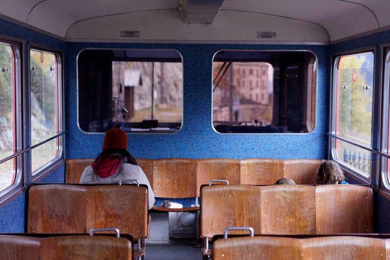 musician riding a train to find song inspiration