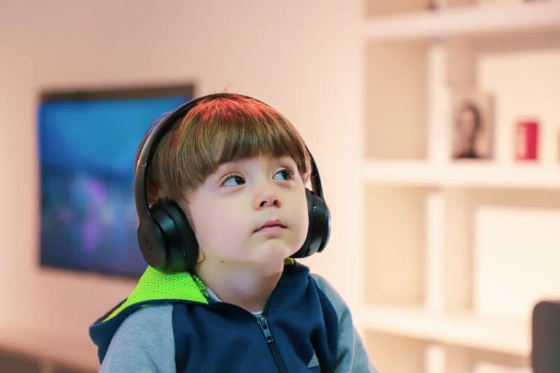 kid listening to music