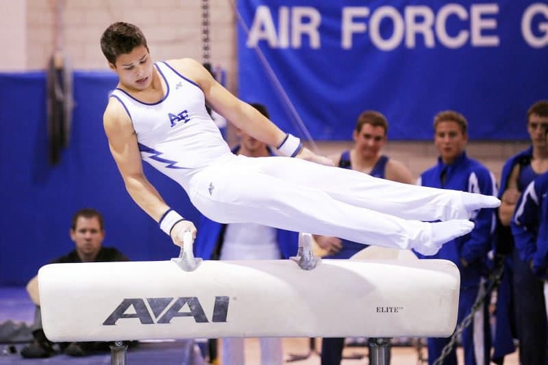 image of gymnast symbolizing the hard practice it takes to sing