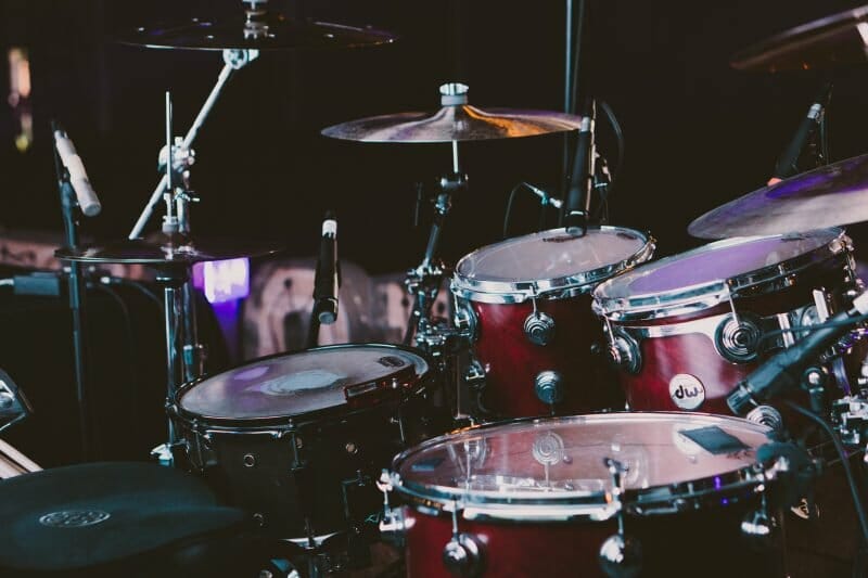 drum kit with microphones set around it