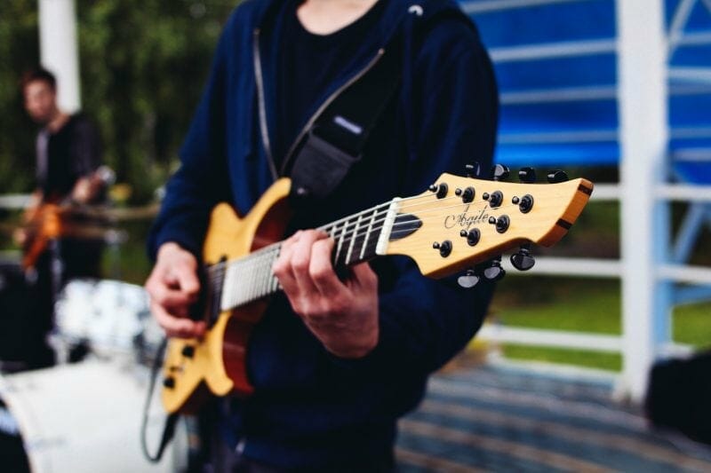 tan electric guitar