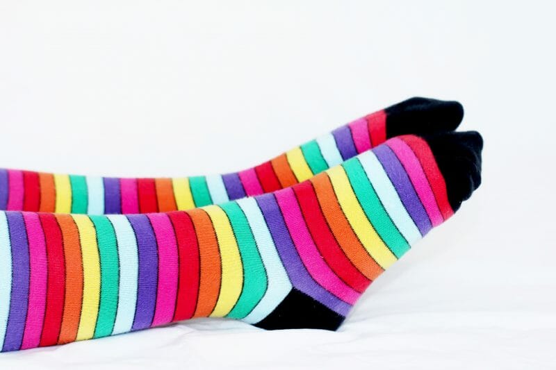 custom made socks in a colorful rainbow pattern