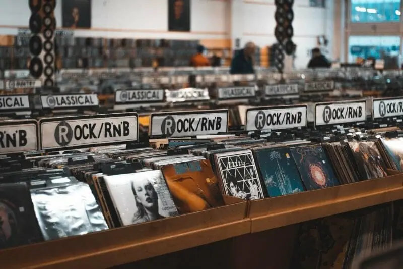 shelves full of albums at a record store