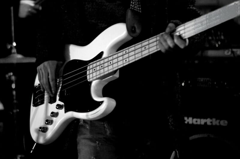 bassist playing fingered bass