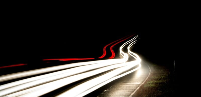 long exposure photo of car lights passing