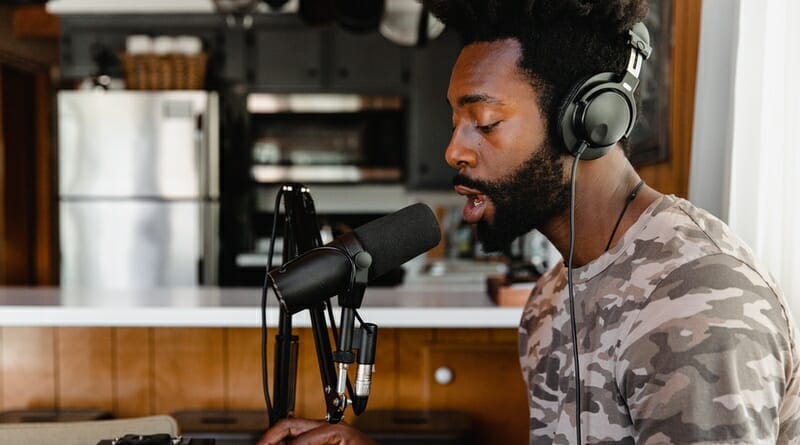 vocalist singing into a microphone