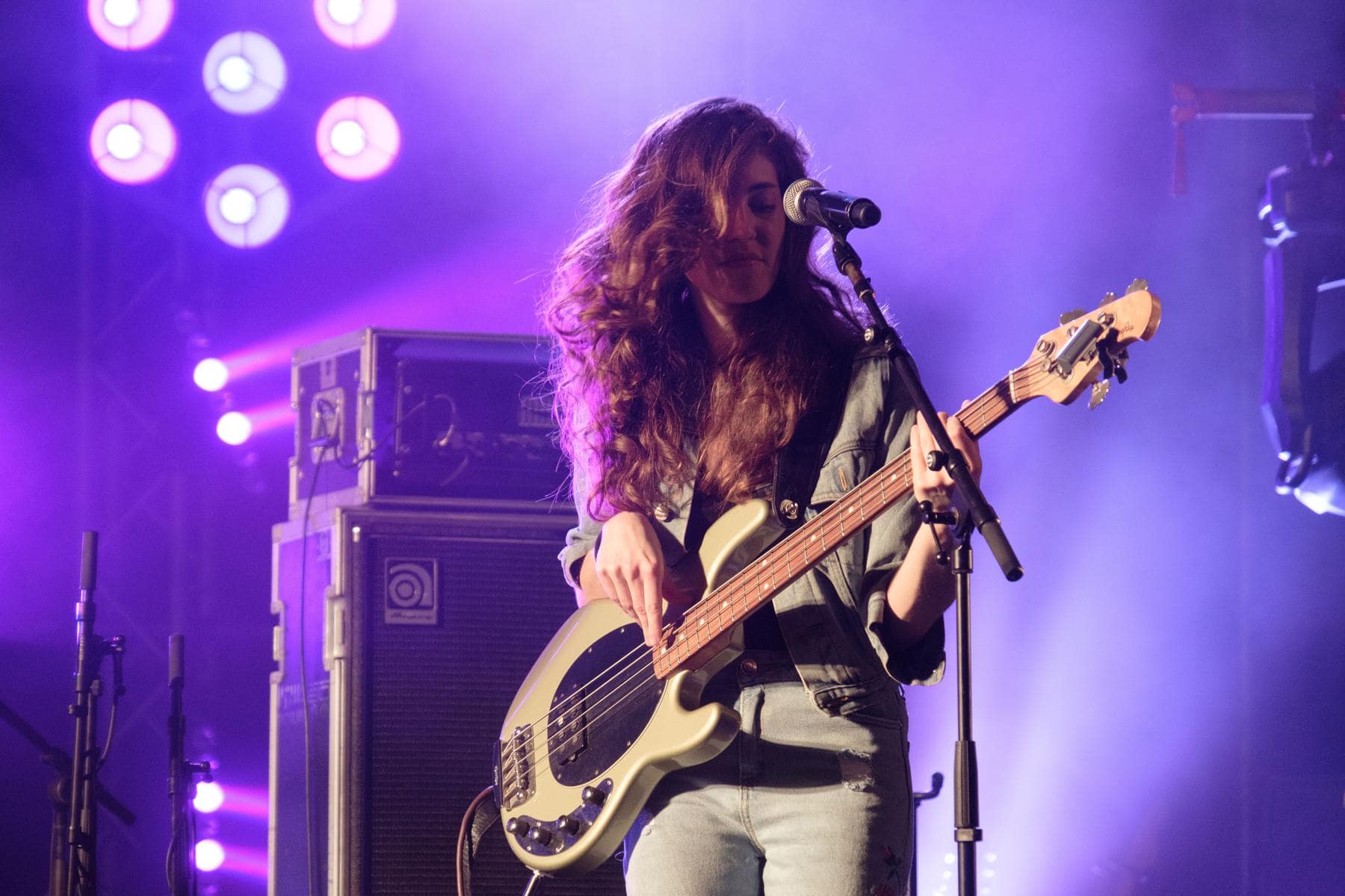 bassist performing on stage