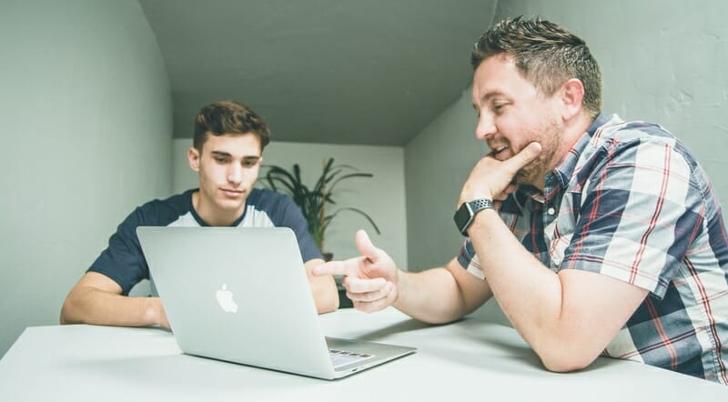 musician talking with mentor