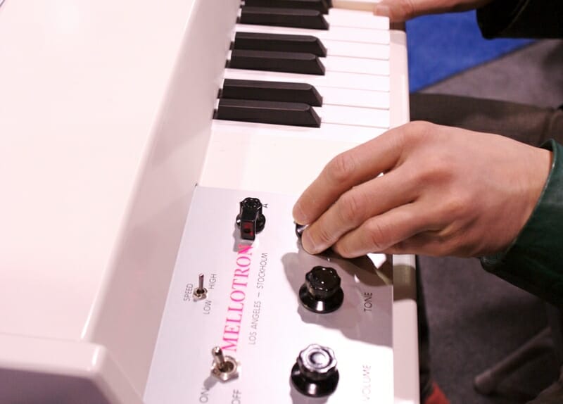 person playing a mellotron